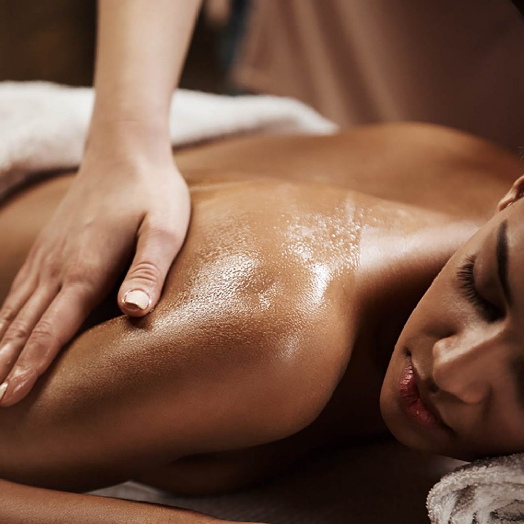 Female receiving a shoulder massage