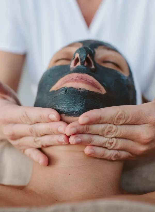 Female enjoying facial and face massage